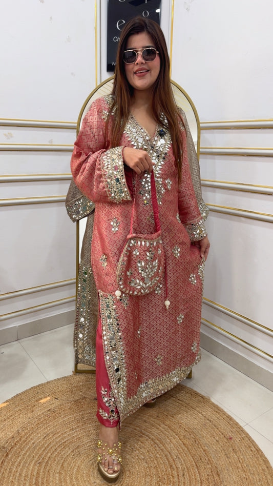 Latest single piece side slit dress made over pure ziraff silk pure material with premium pure diamond cut mirror detailing all over with pants Potli GF925