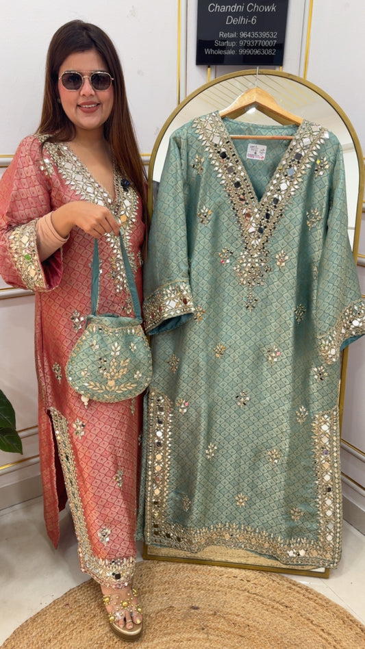 Latest single piece side slit dress made over pure ziraff silk pure material with premium pure diamond cut mirror detailing all over with pants Potli GF925