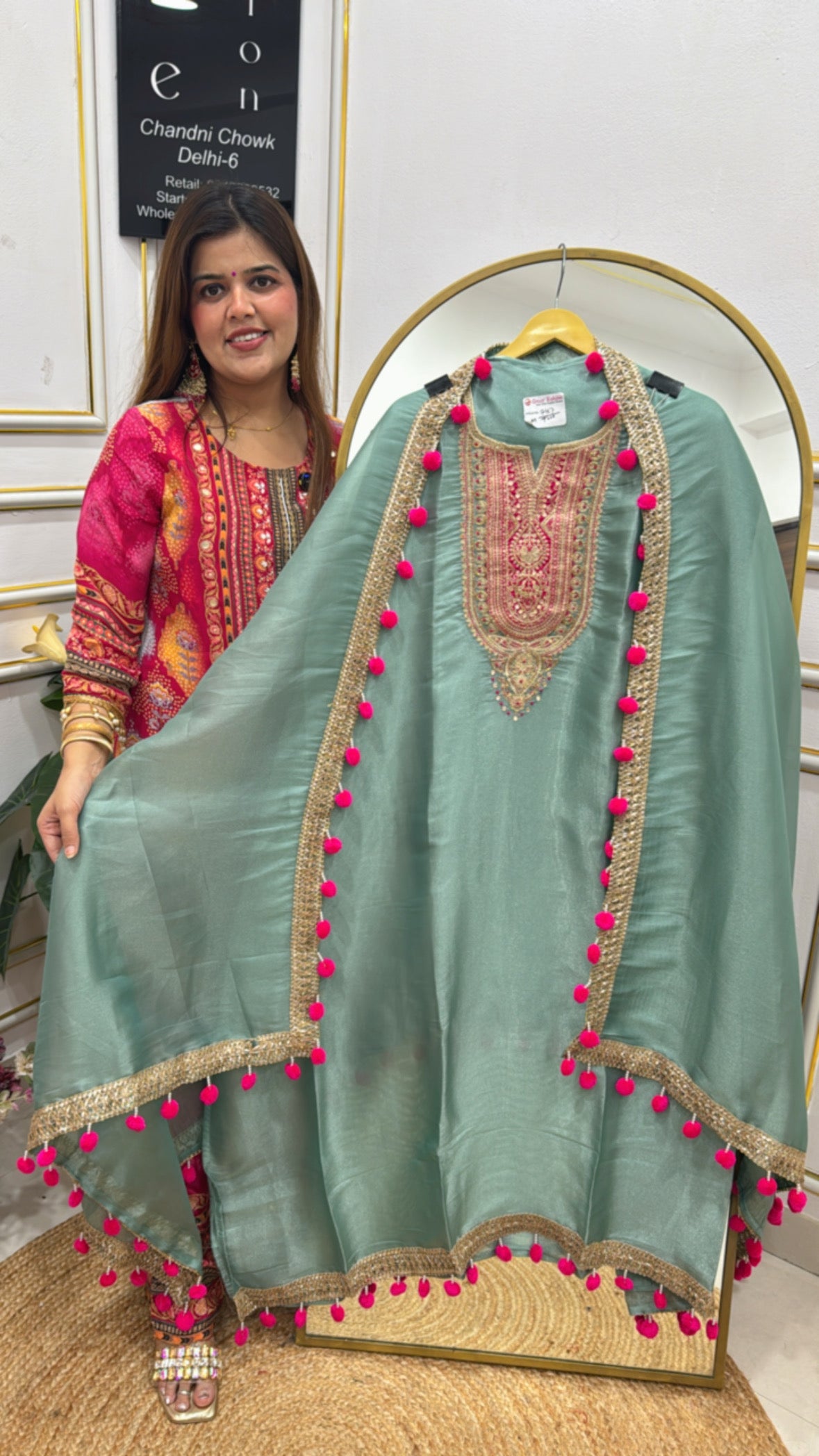 Designer and trending neck handwork premium shimmer silk suit material with all over beautiful pom-pom detailing GF634