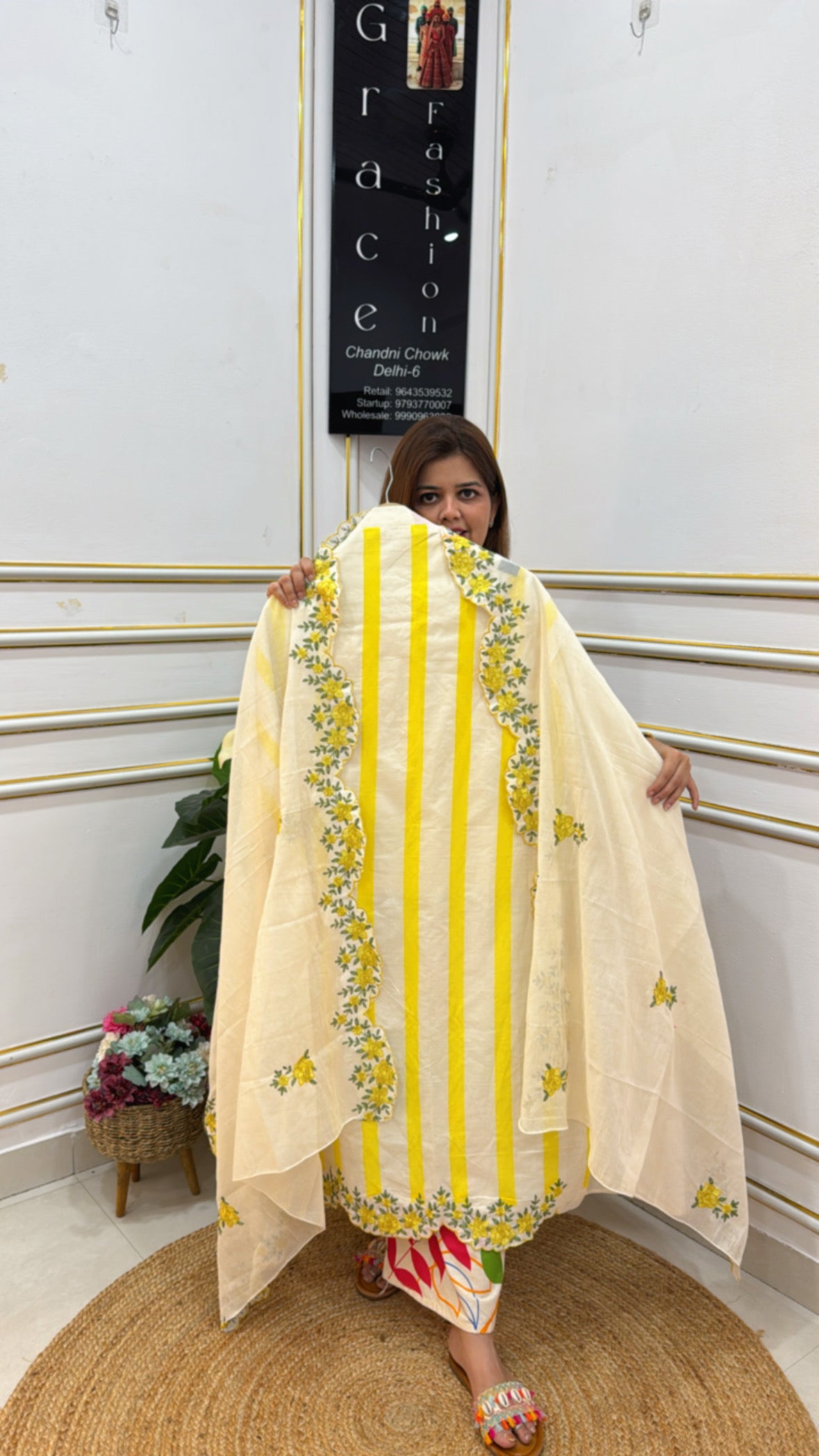Elegant yellow and cream embroidered cape from The Grace Fashion, perfect for stylish layering.