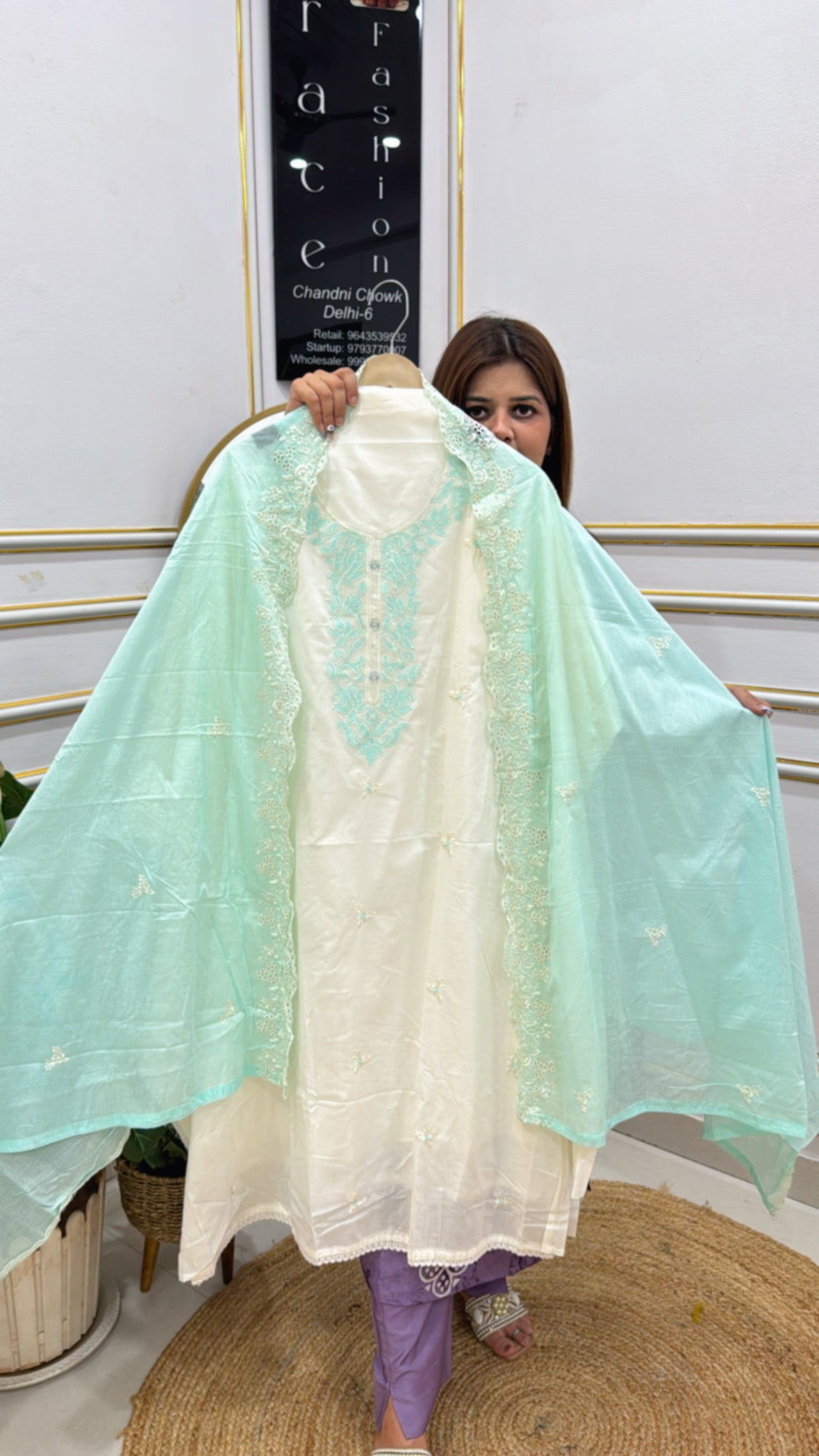 Elegant cotton applique neck suit in mint green and white, perfect for formal occasions