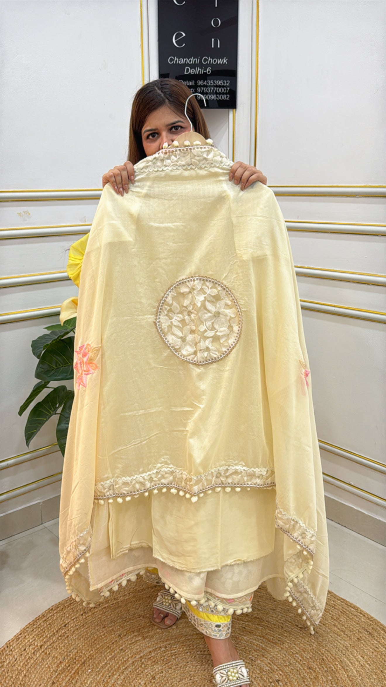 Elegant yellow embroidered dupatta from The Grace Fashion featuring floral designs and decorative border