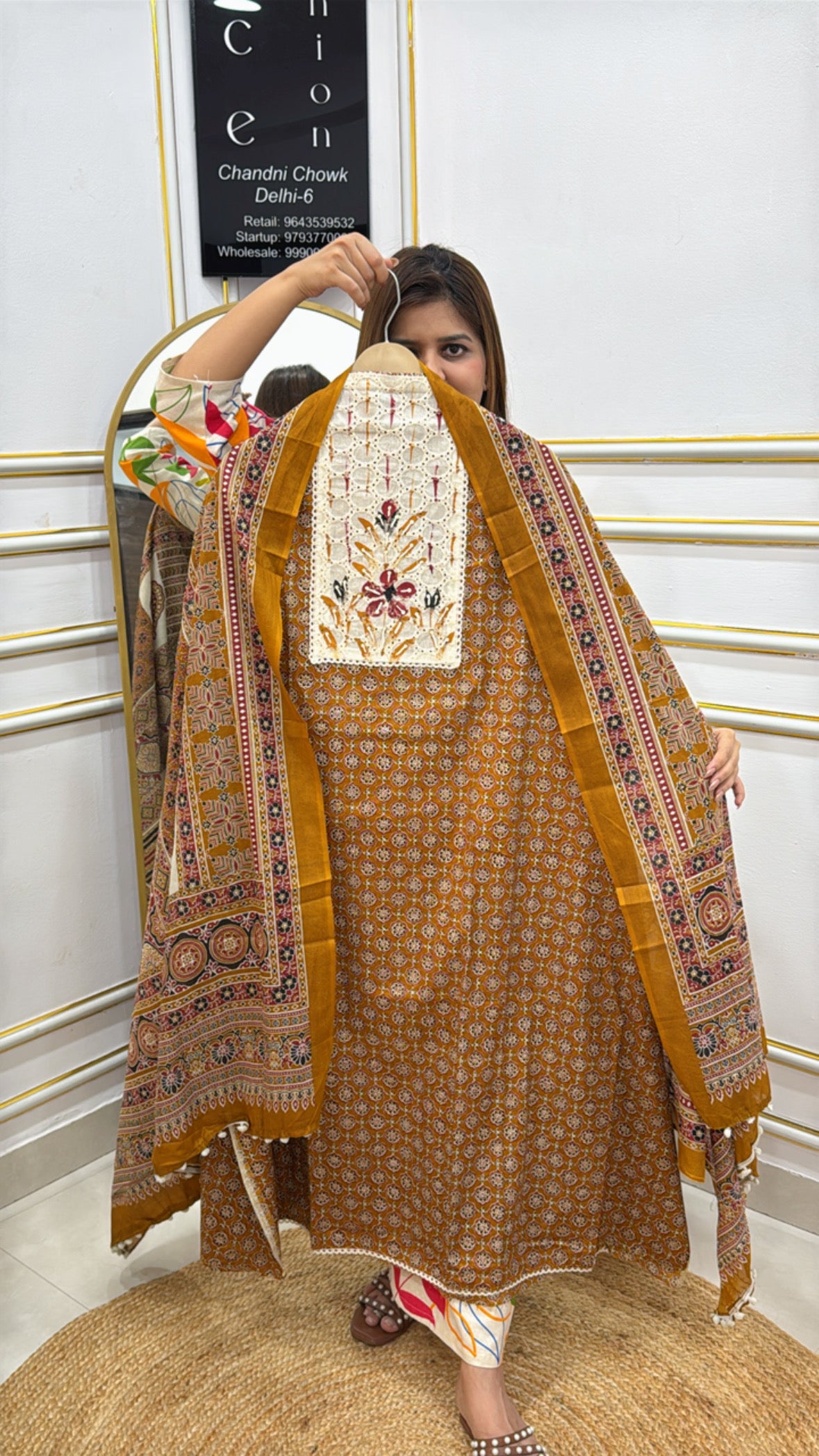 Elegant mustard yellow ethnic outfit from The Grace Fashion with intricate embroidery and traditional patterns