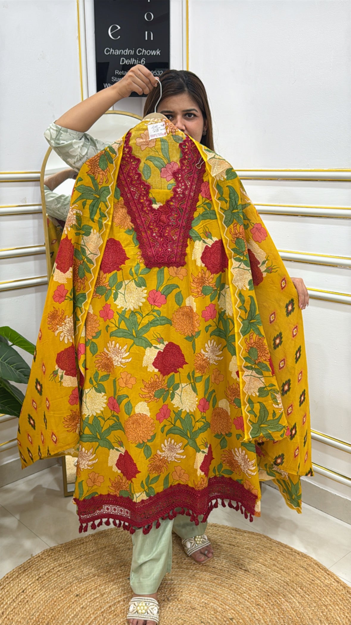 Colorful floral print shawl from The Grace Fashion featuring tassels and intricate embroidery