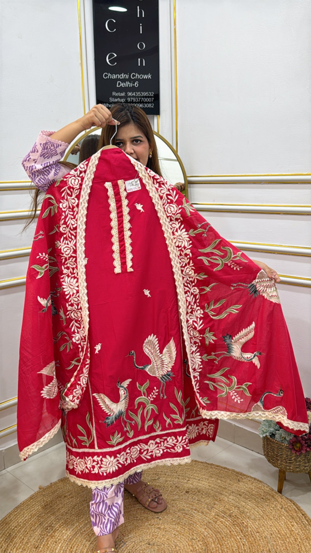 Beautiful flamingo designer cotton suit in vibrant red with intricate floral embroidery and elegant design