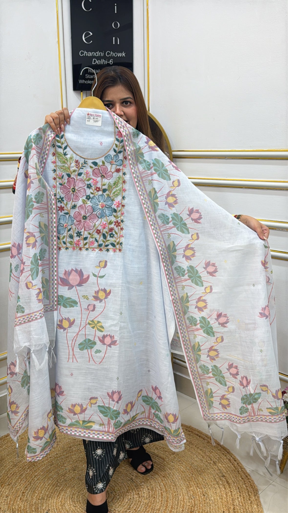 Elegant linen Jamdhani suit with floral patterns and pastel colors for a stylish look