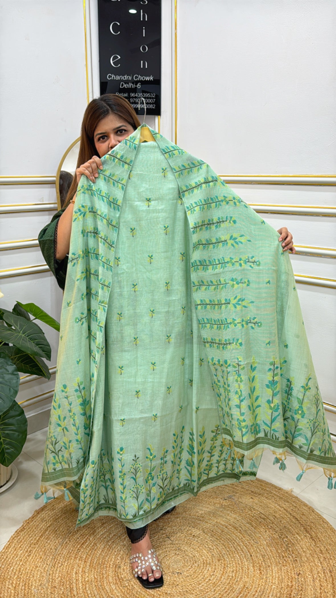 Elegant linen jamdhani unstitched suit in green with floral embroidery and tassels for festive occasions