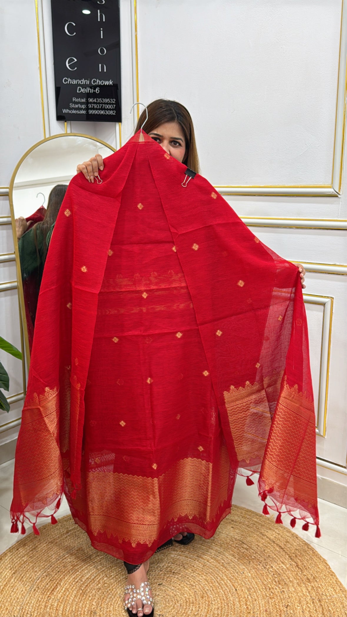 Red Linen Jamdhani unstitched suit with intricate gold patterns and tassels for elegant styling