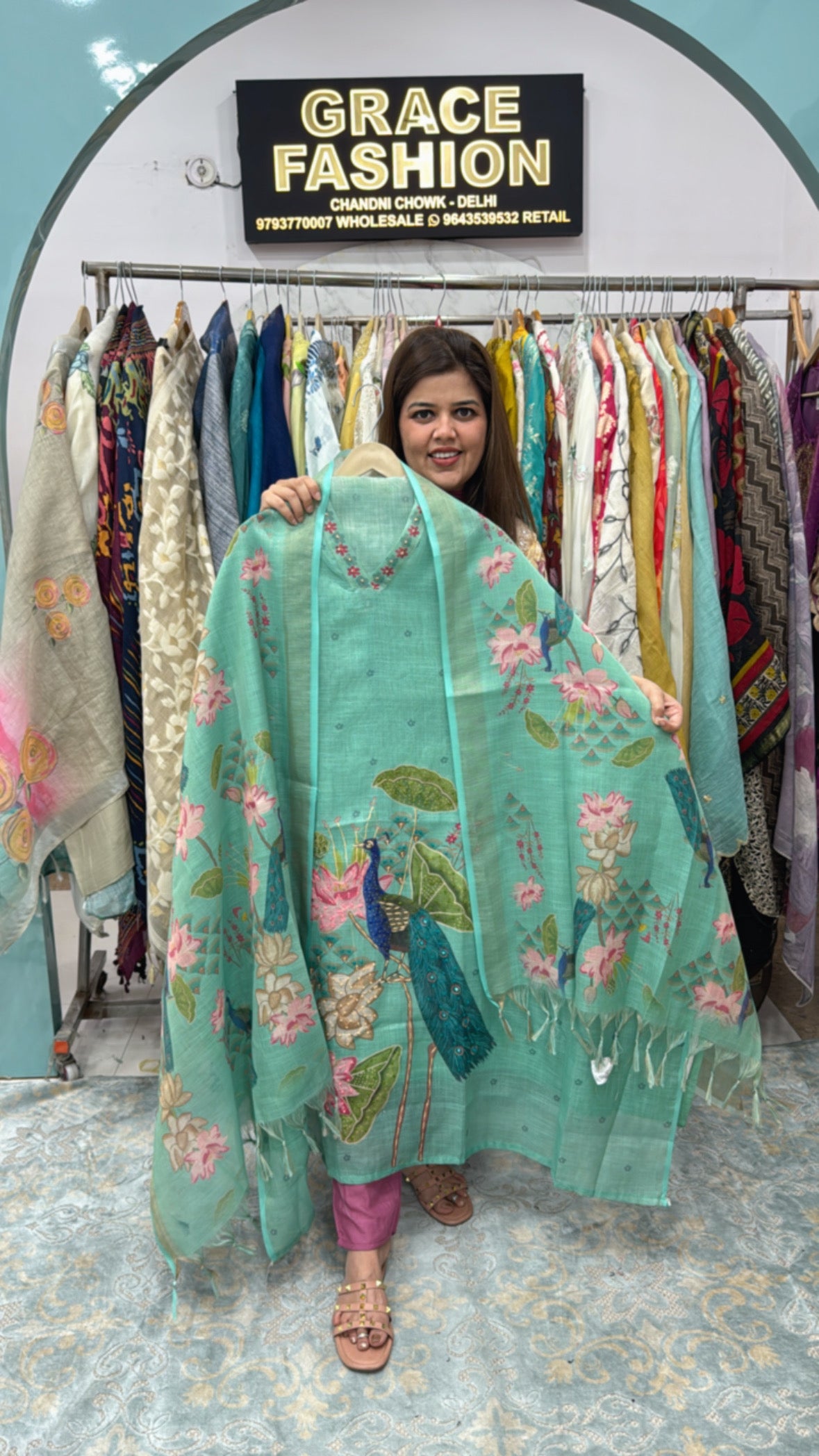 Model showcasing beautiful Linen semi party wear suits with colorful floral designs and light fabric