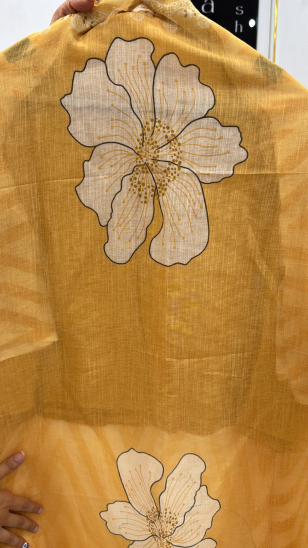 Beautiful floral patterned linen shirt fabric unstitched in warm golden hues for crafting elegant garments