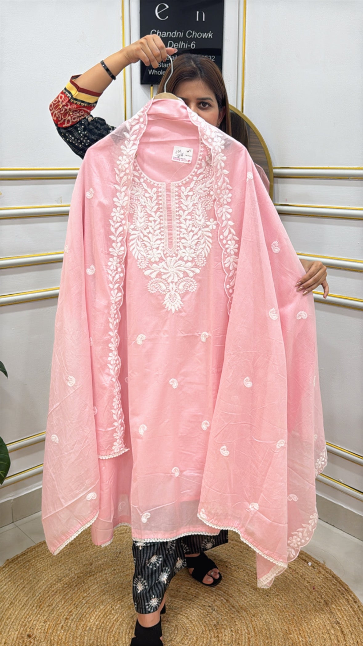Pink Lucknowi cotton suit material with intricate floral embroidery, perfect for traditional wear