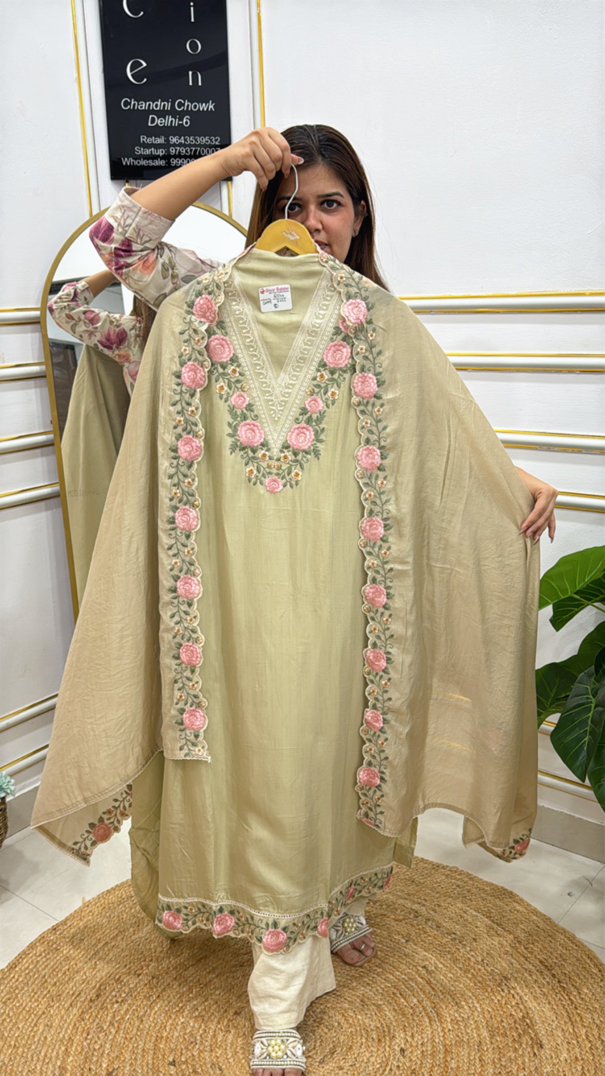 Elegant modal cotton designer suits in soft green with floral embroidery for stylish occasions