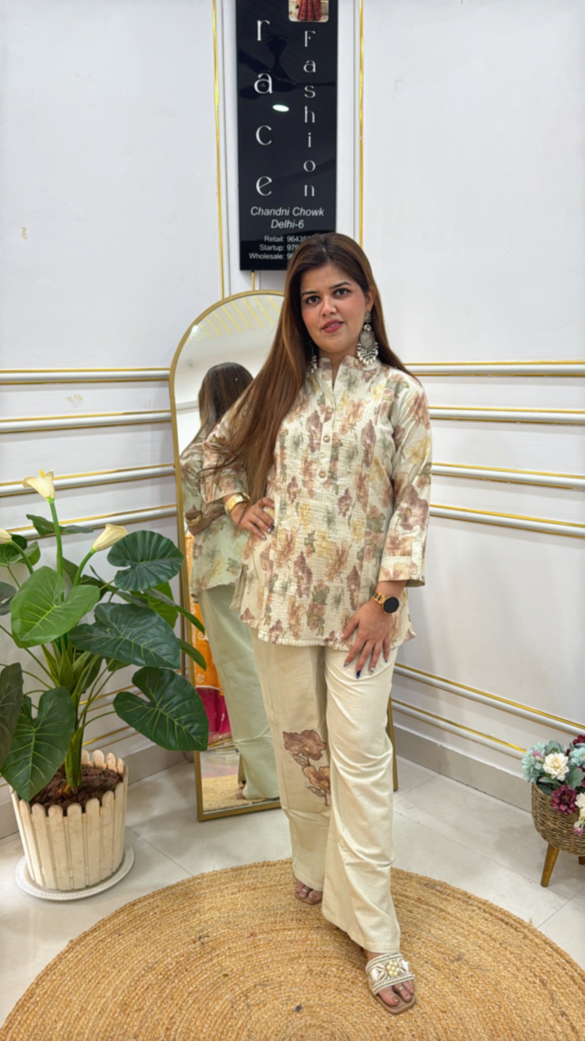 Stylish pastel floral co-ord set featuring a patterned top and wide-leg pants for a trendy look