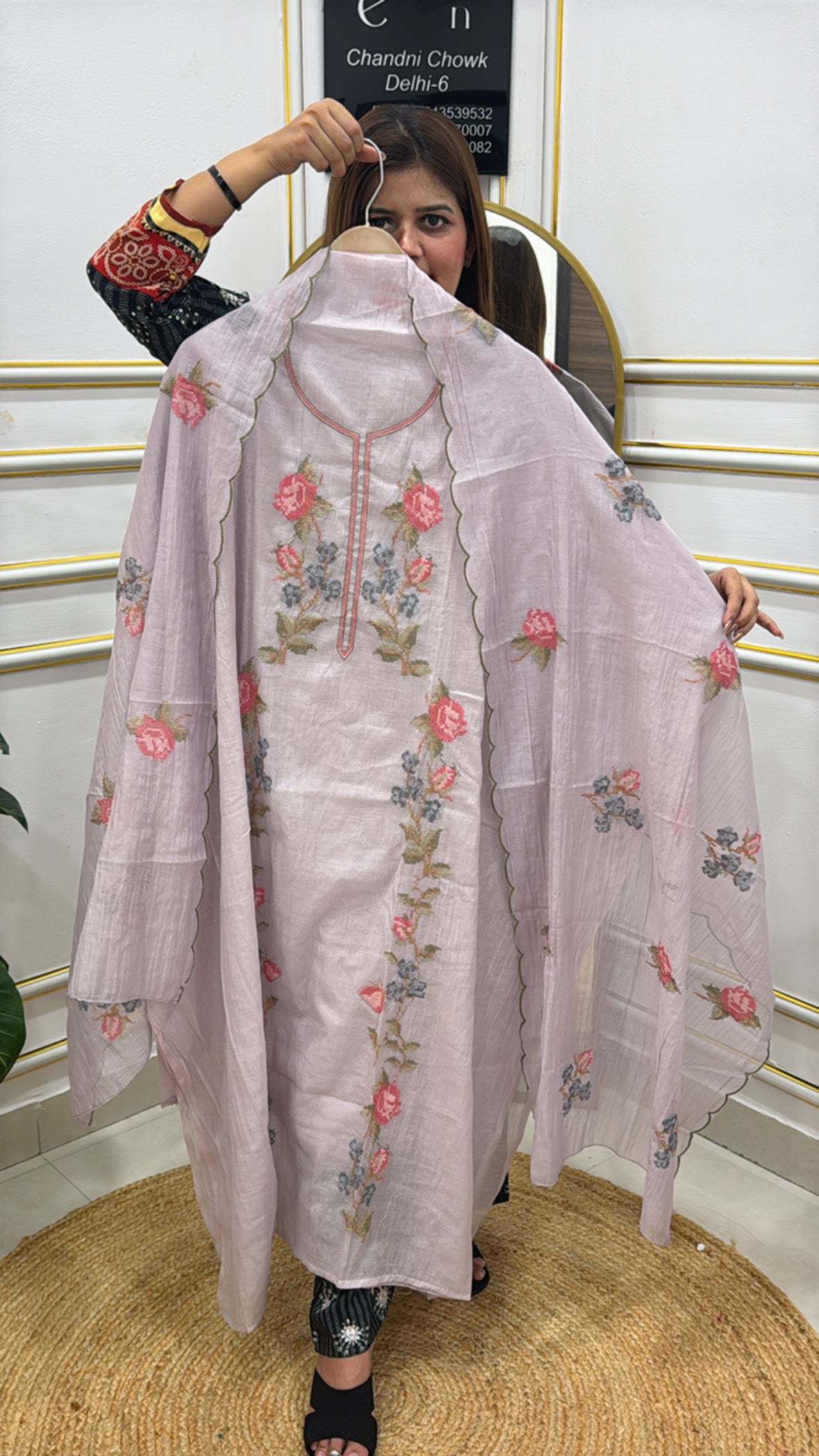 Elegant pink kurta with floral embroidery made from premium cotton silk fabric, perfect for festive occasions