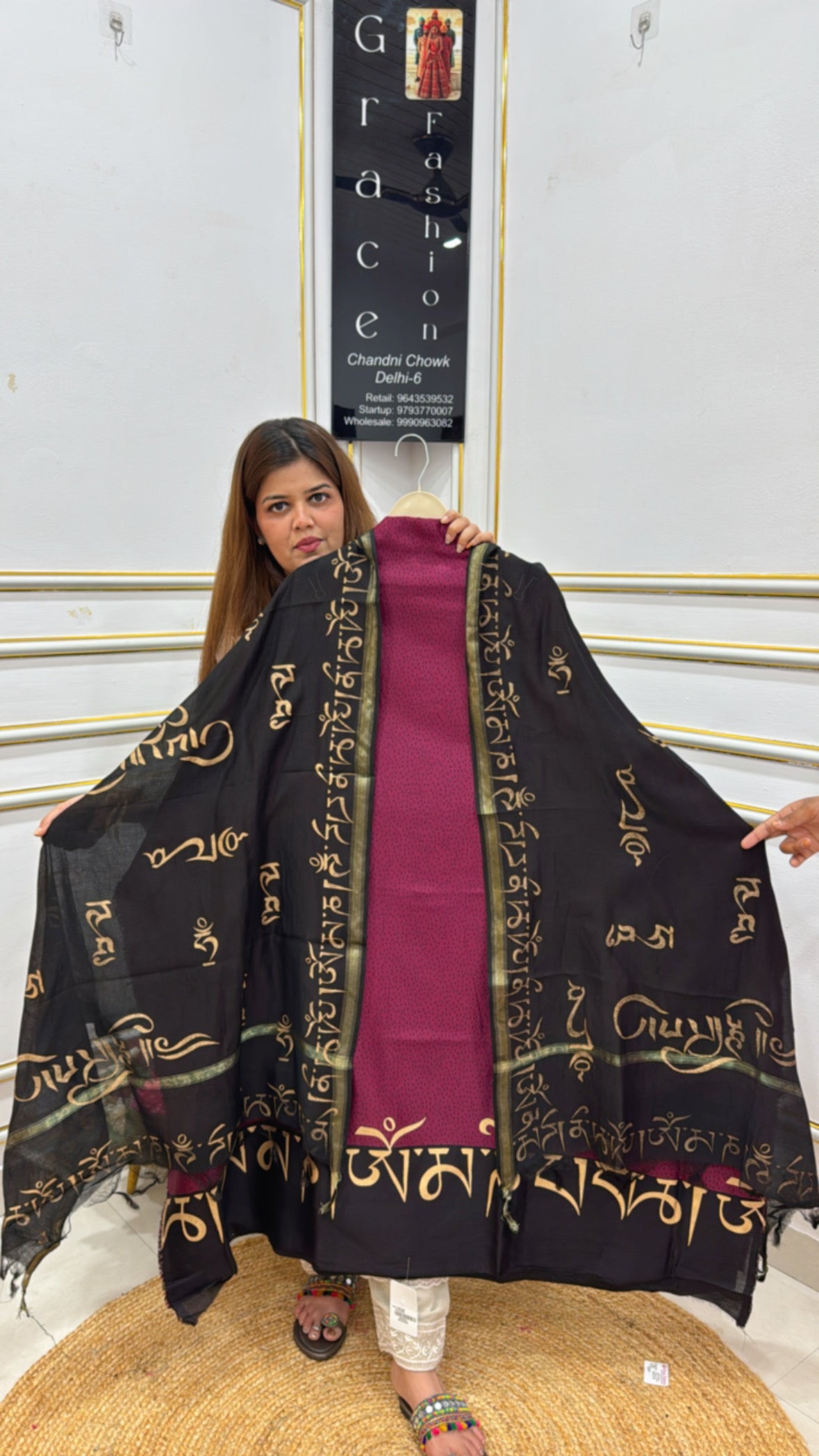 Model showcasing a premium cotton silk suits with intricate designs and lightweight fabric perfect for elegant occasions