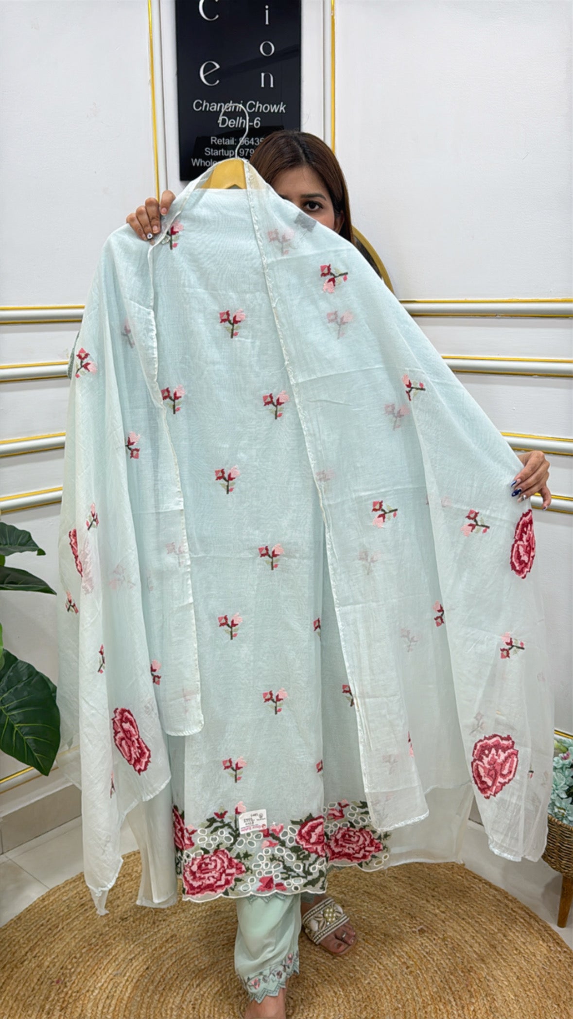 The Grace Fashion premium embroidered fabric suit in light blue with floral designs and matching dupatta