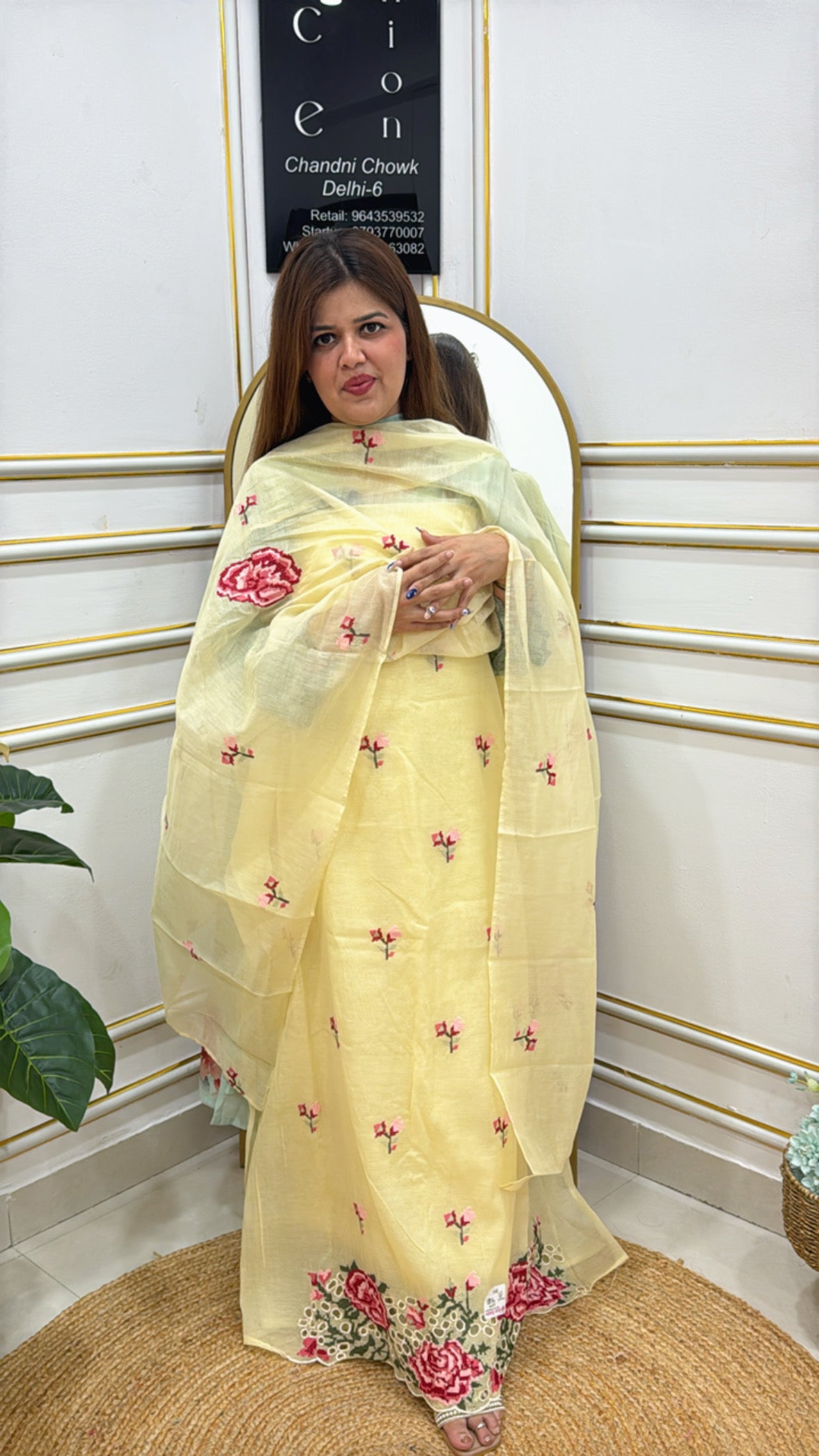 Elegant premium embroidered fabric suit in yellow with floral design, perfect for festive occasions