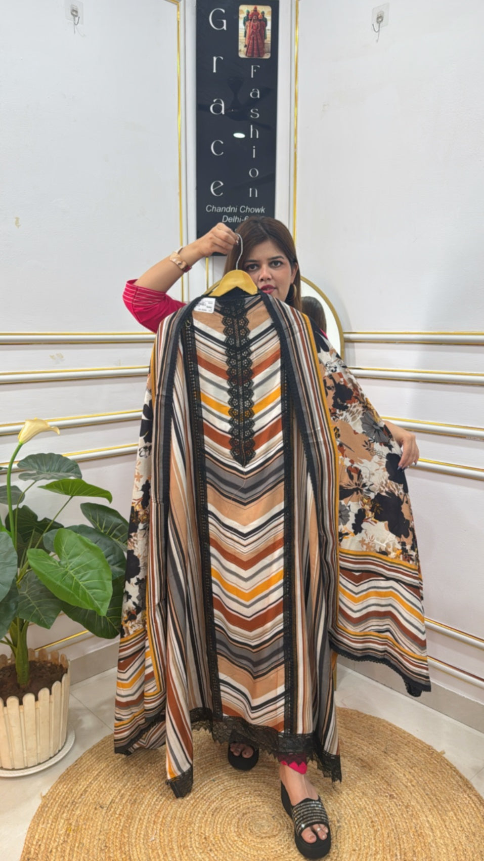 Stylish premium muslin women suit in chevron patterns, perfect for casual or festive occasions