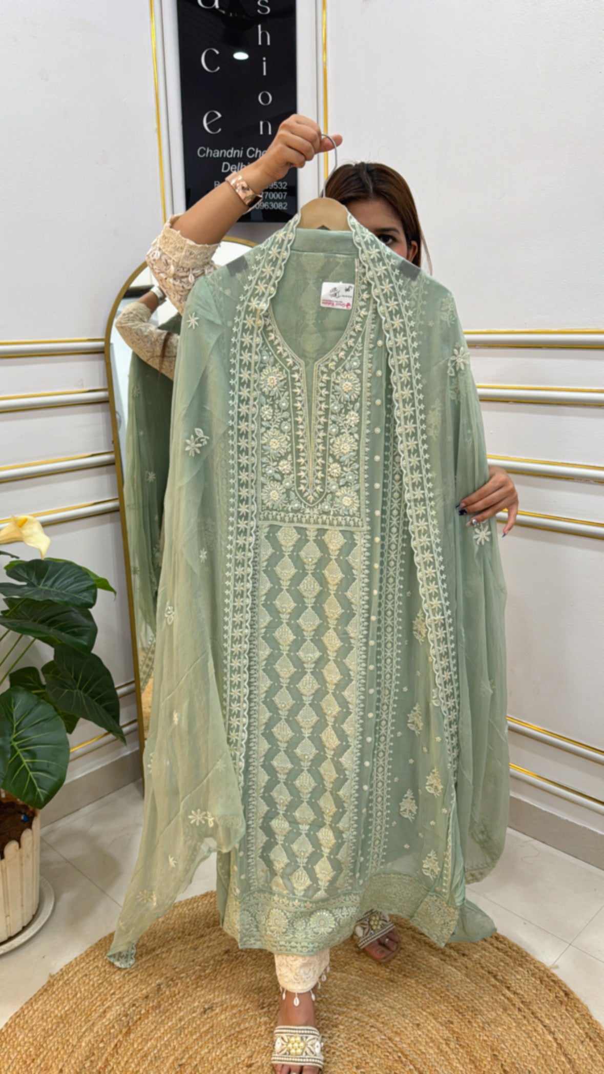 Elegant pure georgette Lucknowi suit in light green with intricate embroidery and matching dupatta