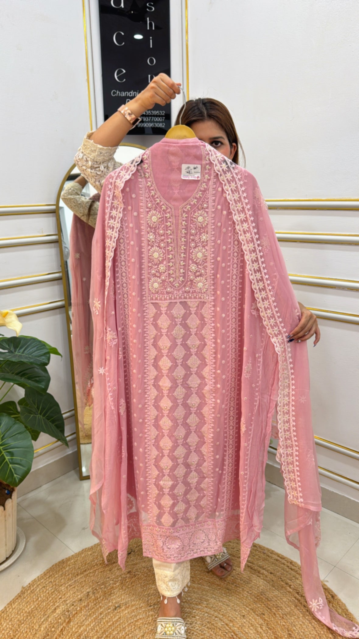 Elegant pink pure georgette Lucknowi suit with intricate embroidery and delicate patterns