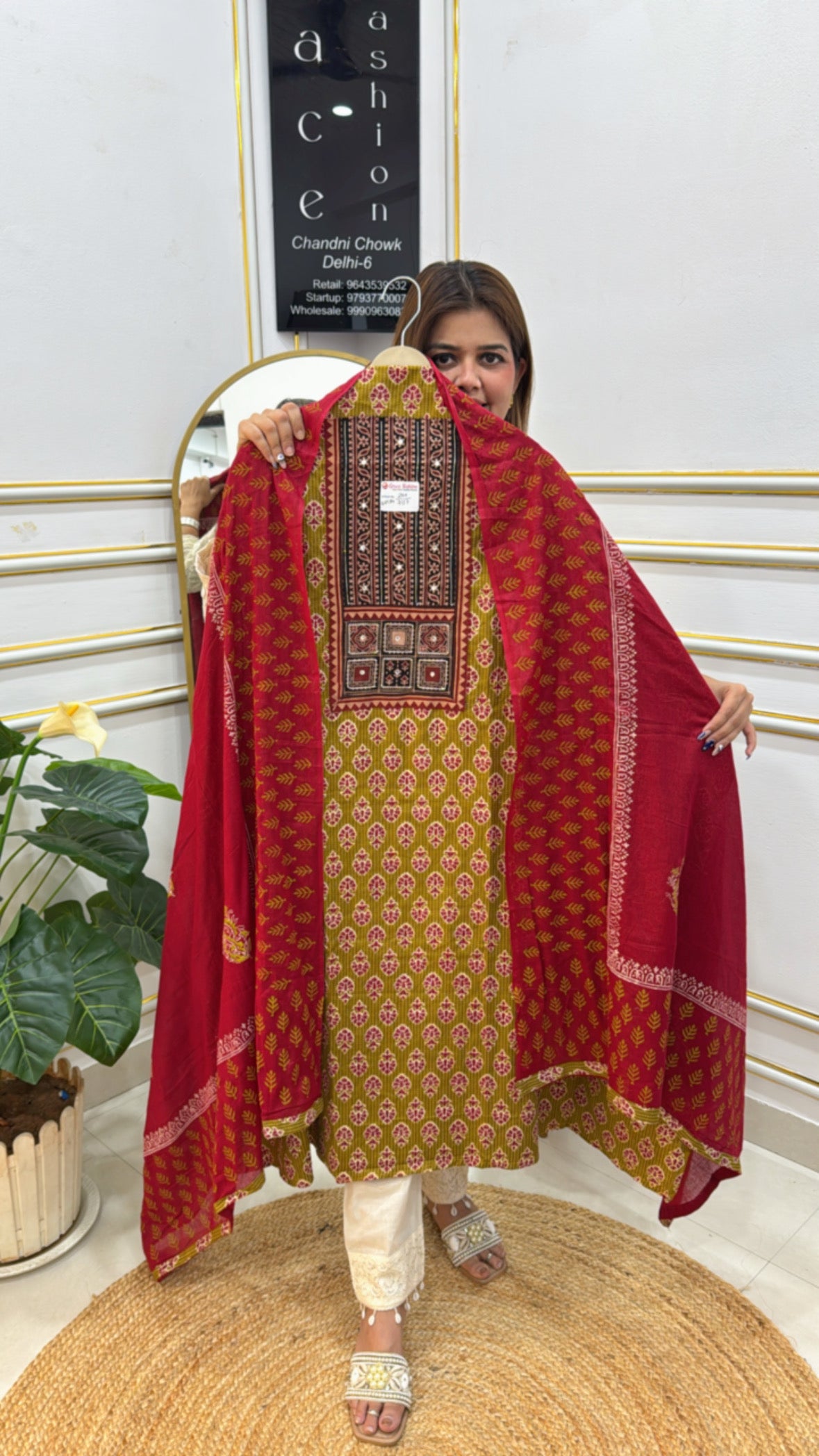 Traditional Cotton Suit Set with intricate embroidery and a contrasting red dupatta for a stylish look