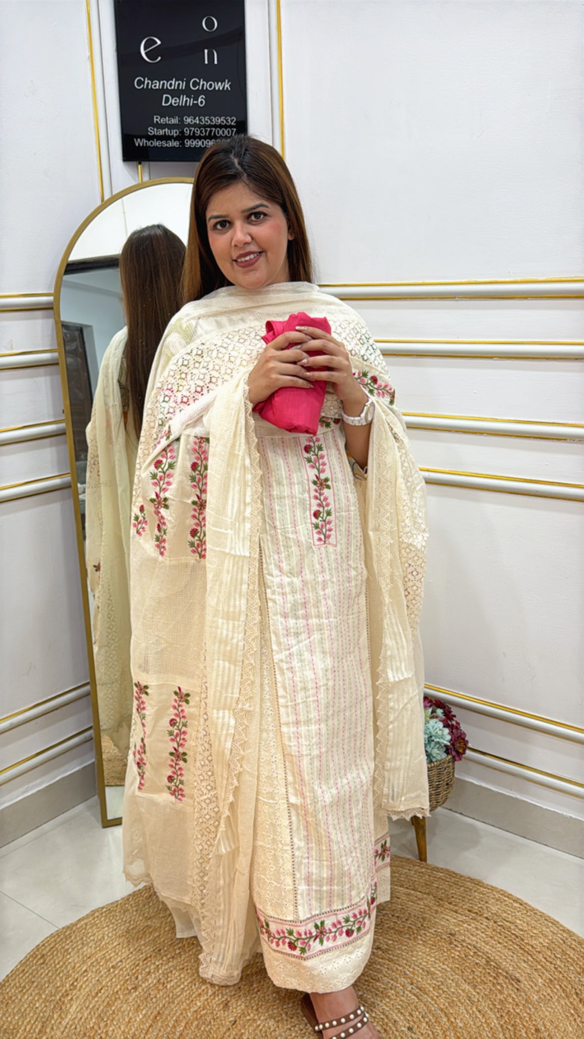 Elegant cream-colored Anarkali suit with floral embroidery, perfect for festive occasions by The Grace Fashion