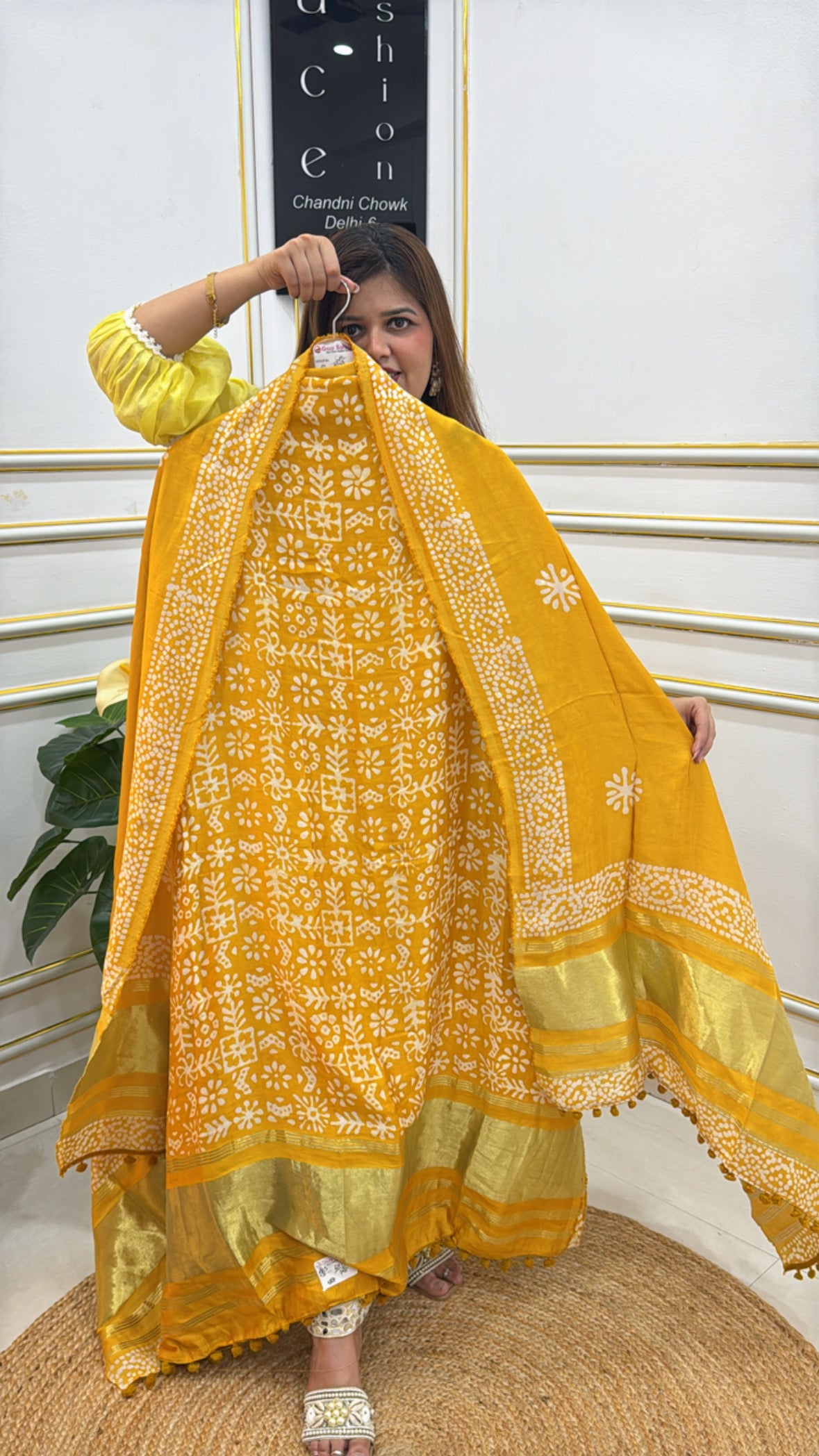 Trendy cotton modal unstitched suit in vibrant yellow with floral print and elegant borders