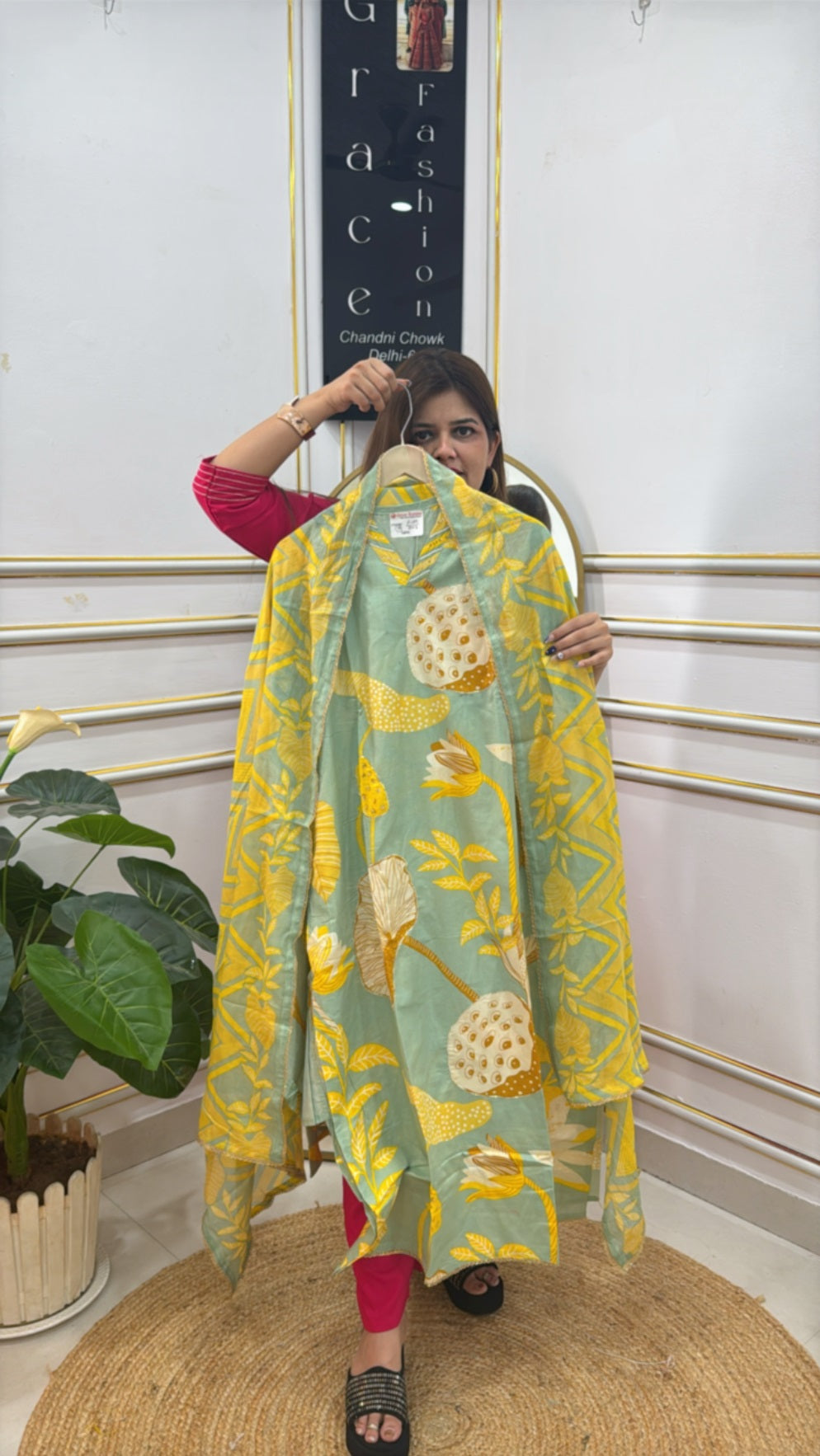 Stylish unstitched ladies suits online with floral design in green and yellow, ideal for festive occasions