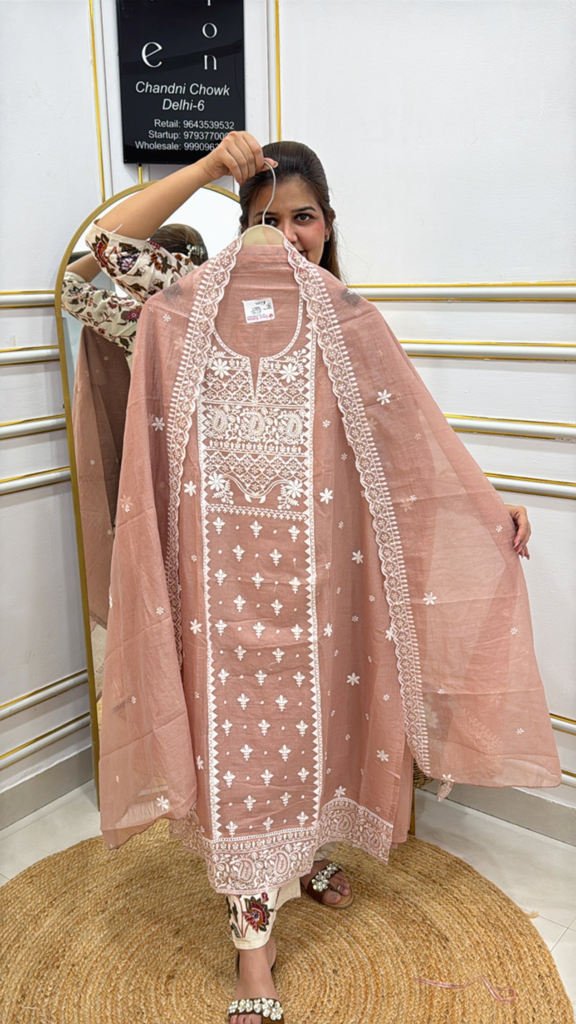Elegant pink embroidered kaftan from The Grace Fashion with intricate white detailing