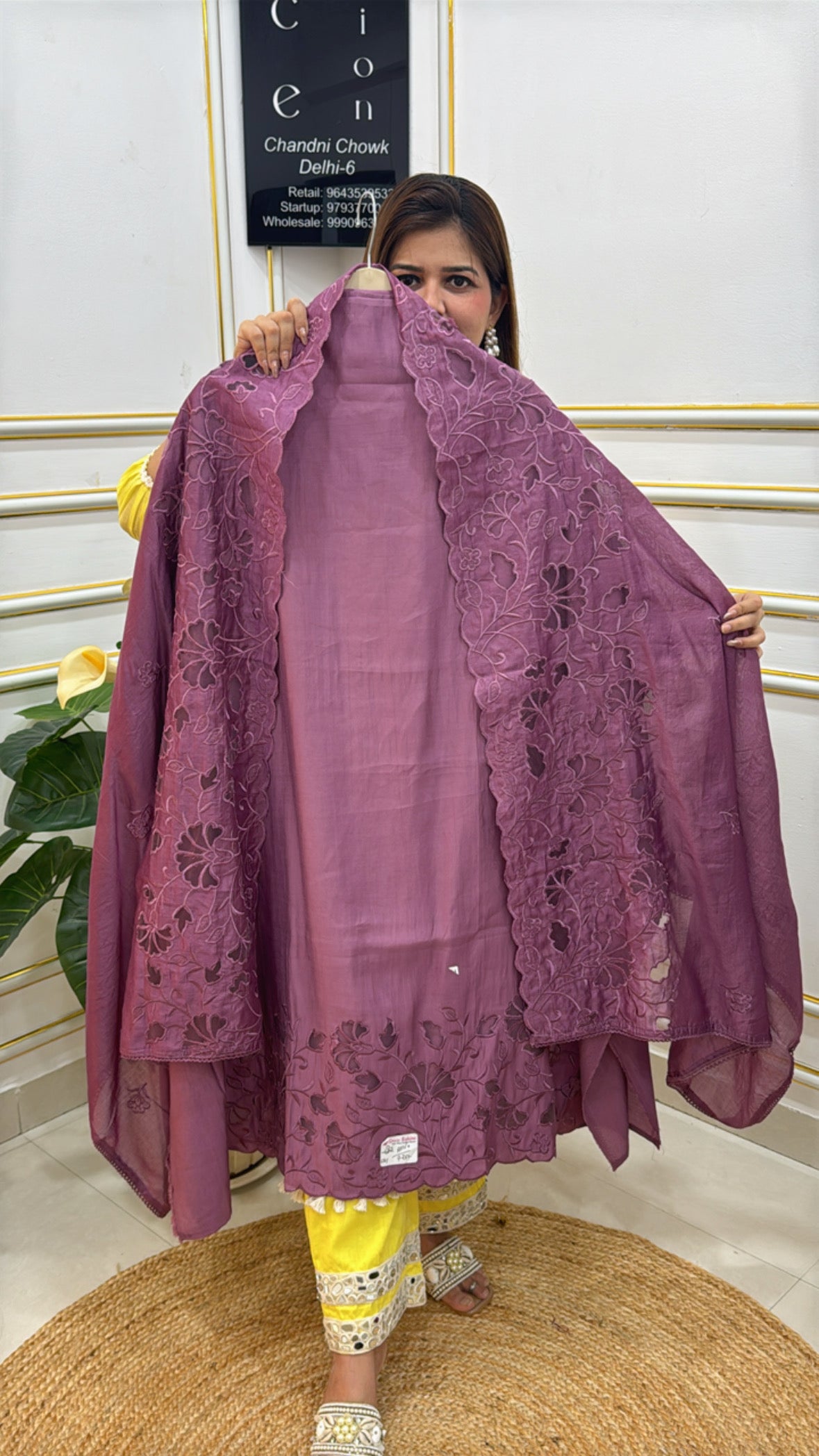 Elegant purple embroidered shawl by The Grace Fashion, showcasing intricate floral designs and soft fabric