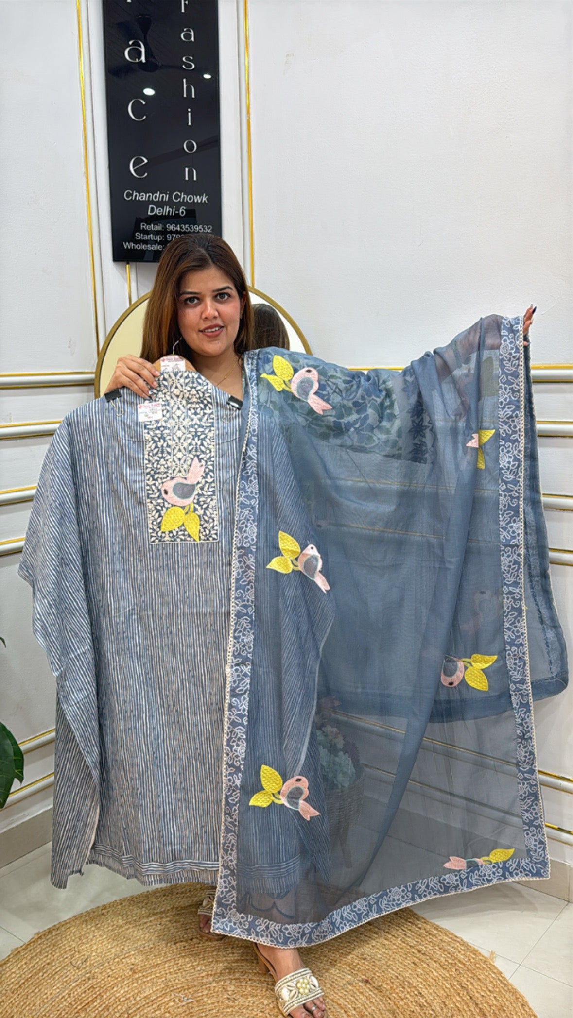 Elegant gray kaftan with floral embroidery, perfect for casual gatherings and summer outings