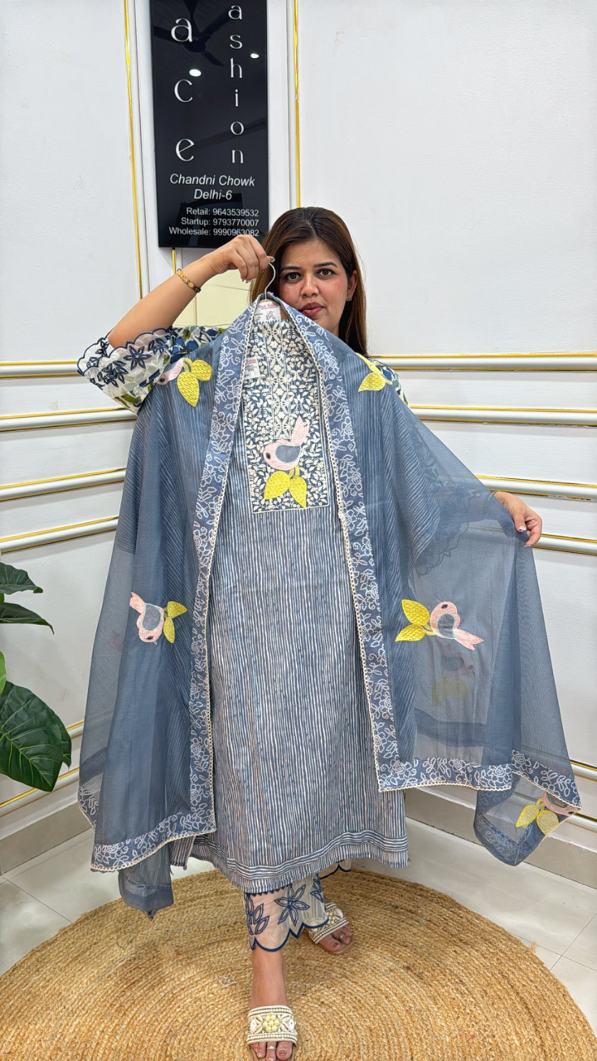 Elegant blue three-piece outfit by The Grace Fashion featuring floral embroidery and lightweight dupatta