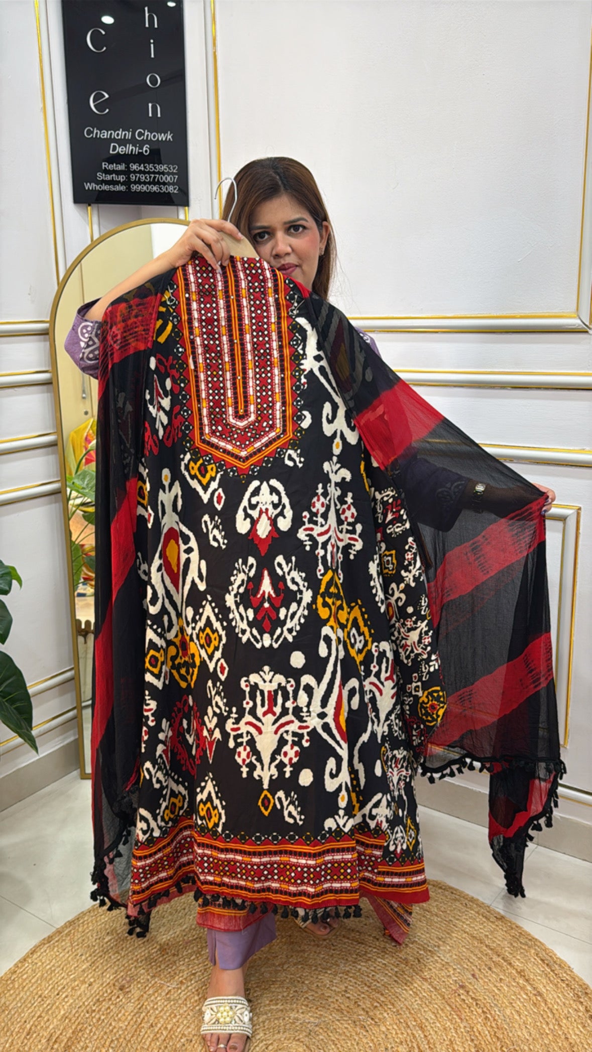 Colorful The Grace Fashion Chunar Chook featuring intricate patterns and vibrant red and black details