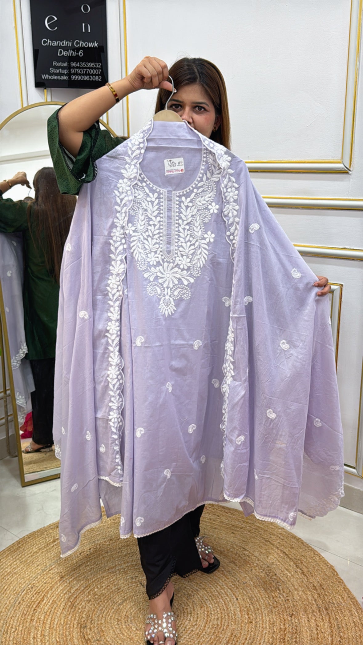 Elegant lavender tunic with intricate white embroidery, perfect for casual wear.