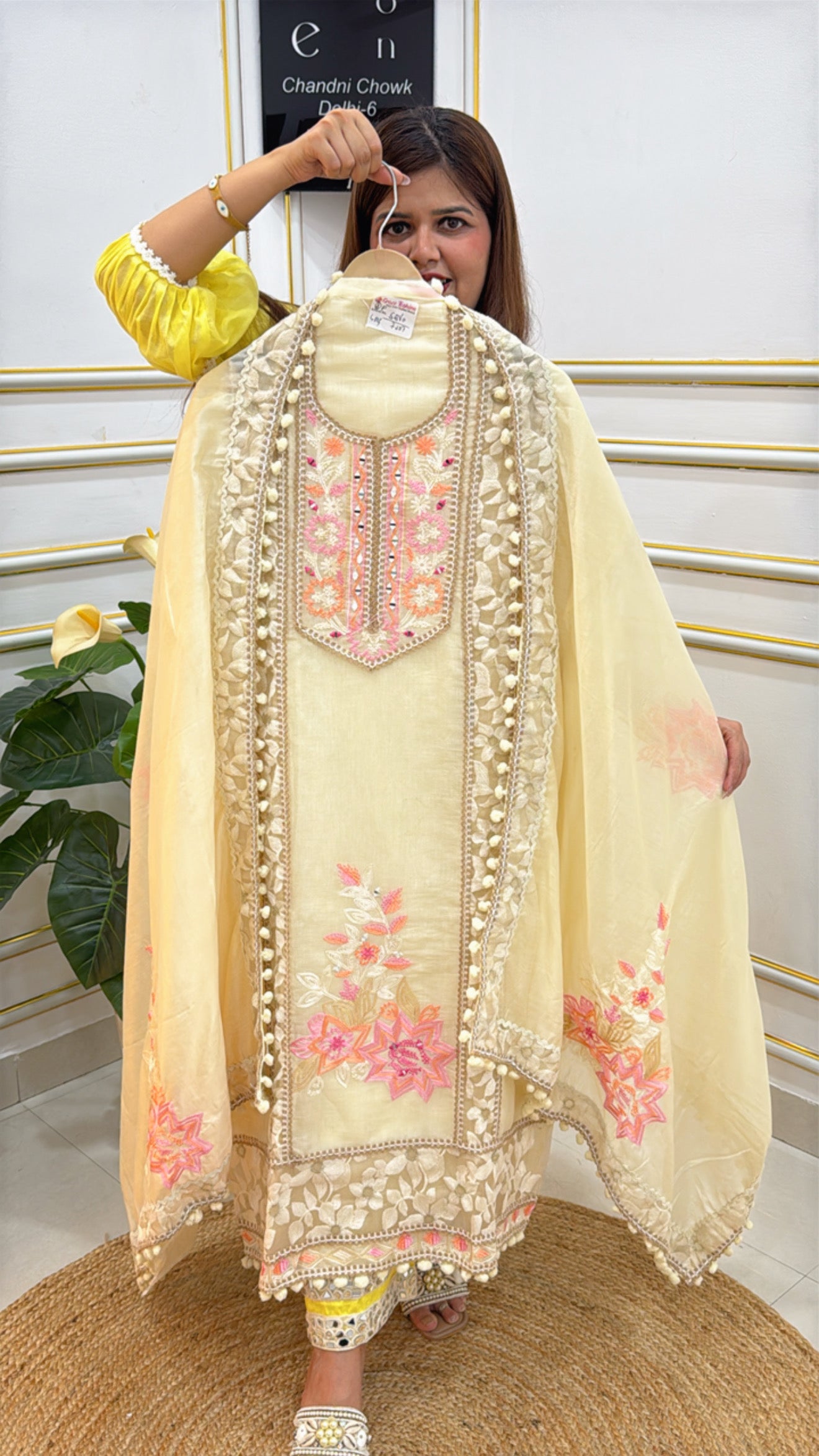 Elegant yellow embroidered Anarkali suit by The Grace Fashion with intricate floral designs